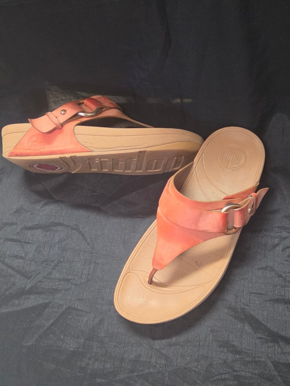 pair of rust colored leather "fitflop" sandals size 6